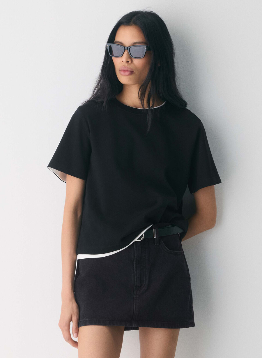 denim forum the 90s ricci denim skirt black eyeliner