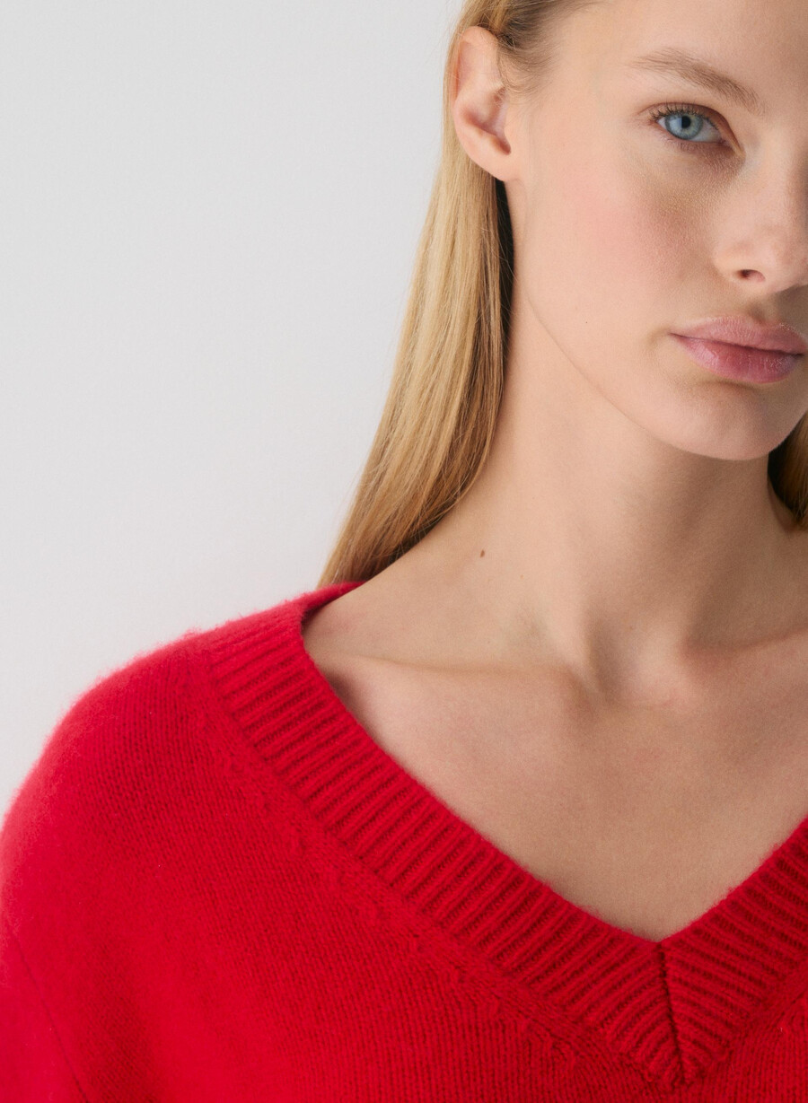 plush cashmere oversized v-neck sweater flashing red