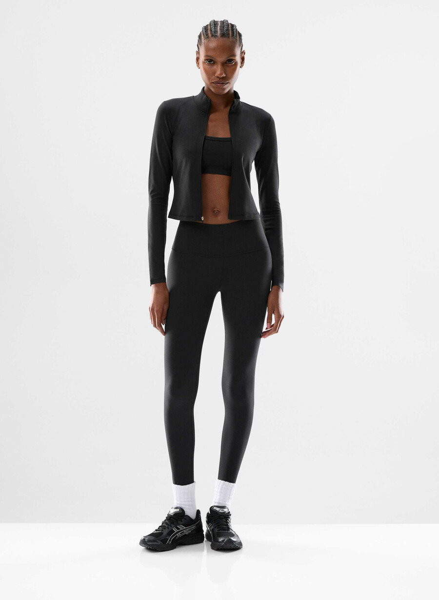 new butter limit zip-up black