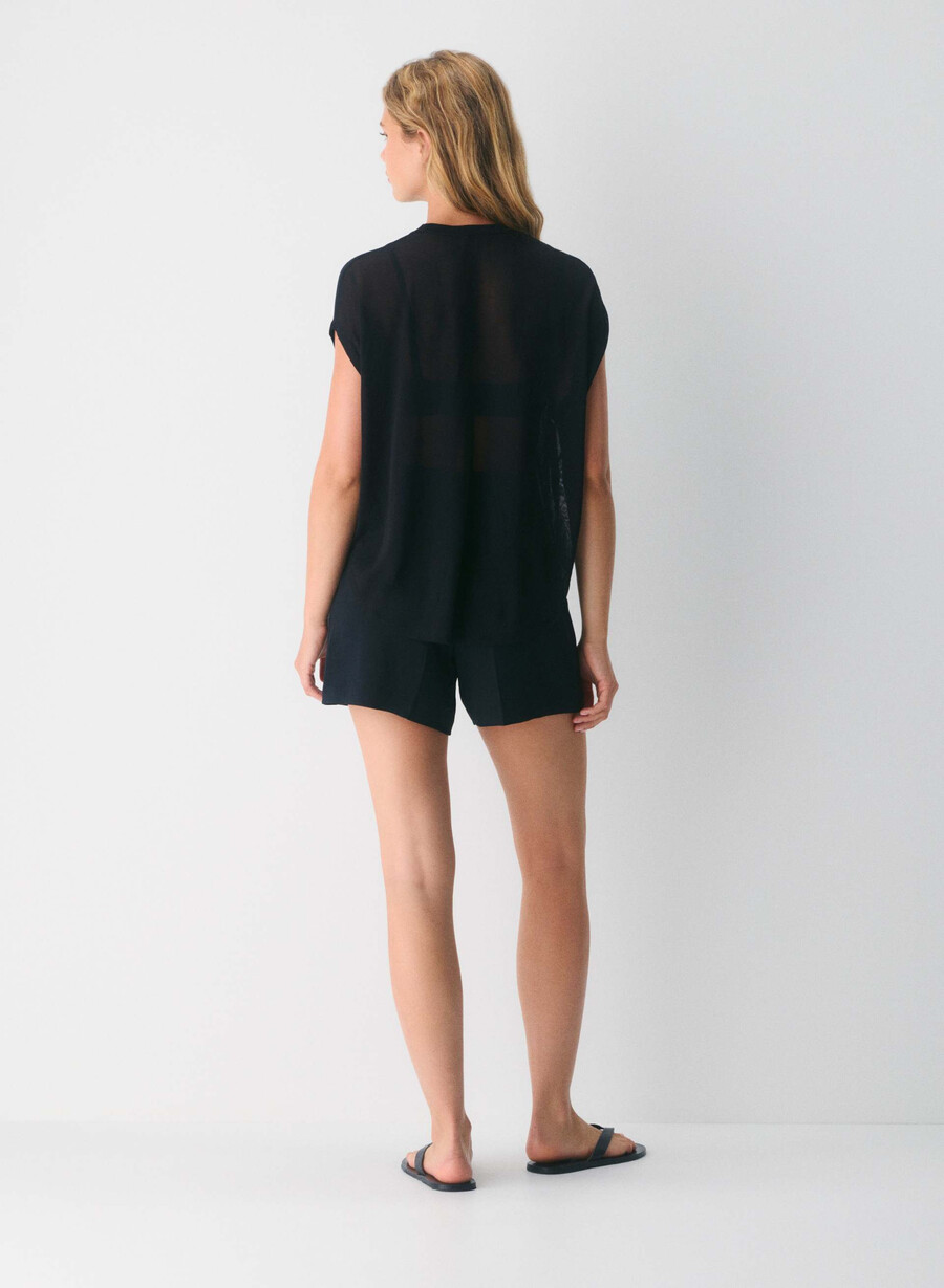 the limitless short curve-fit mid-thigh - crepette black