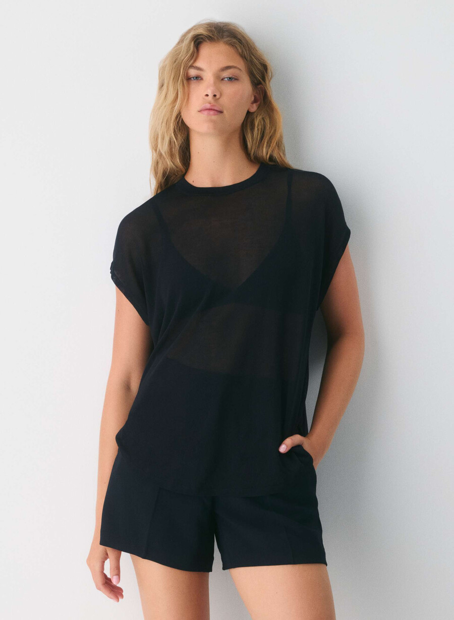 the limitless short curve-fit mid-thigh - crepette black