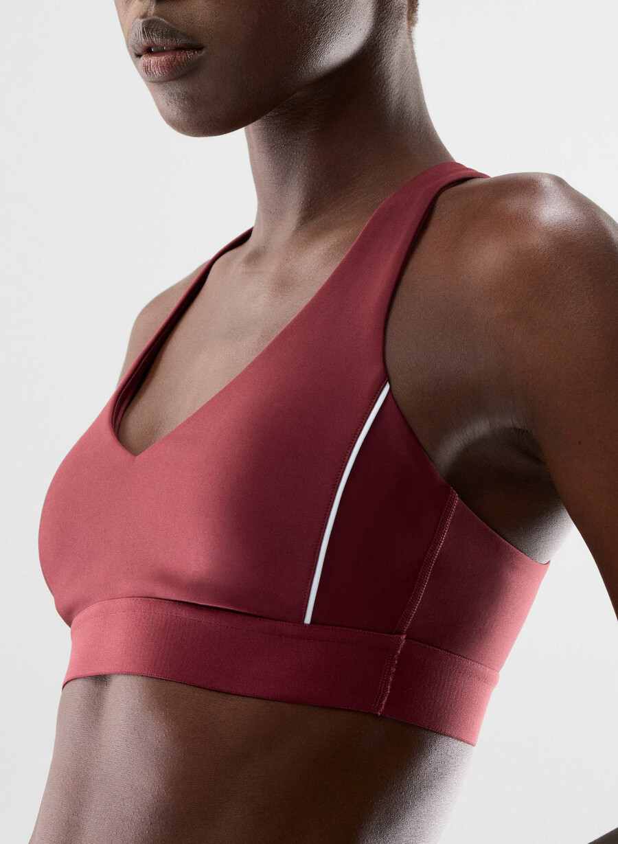 glotone hustle sports bra cordovan bright wht