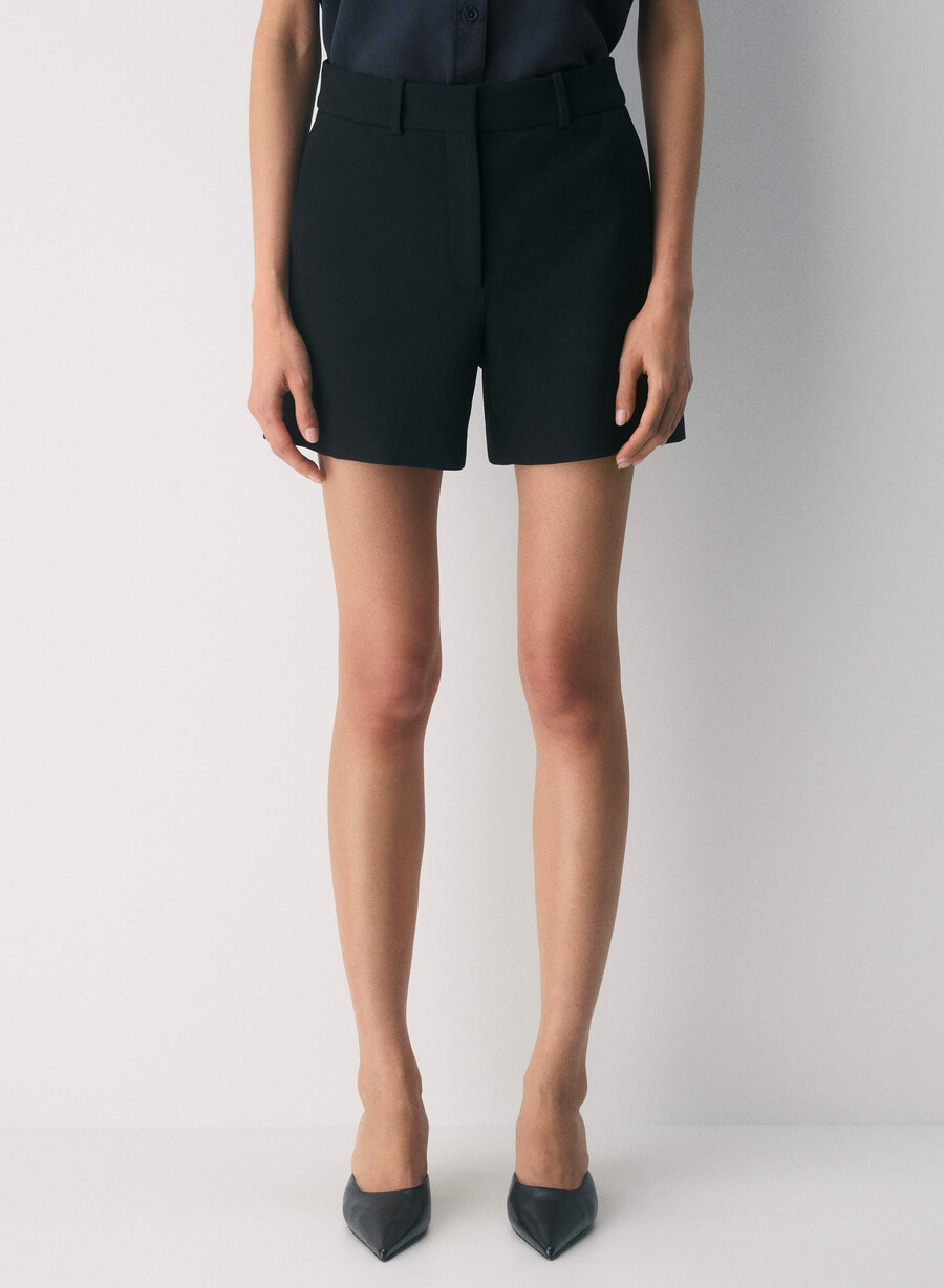 new agency mid-thigh short black
