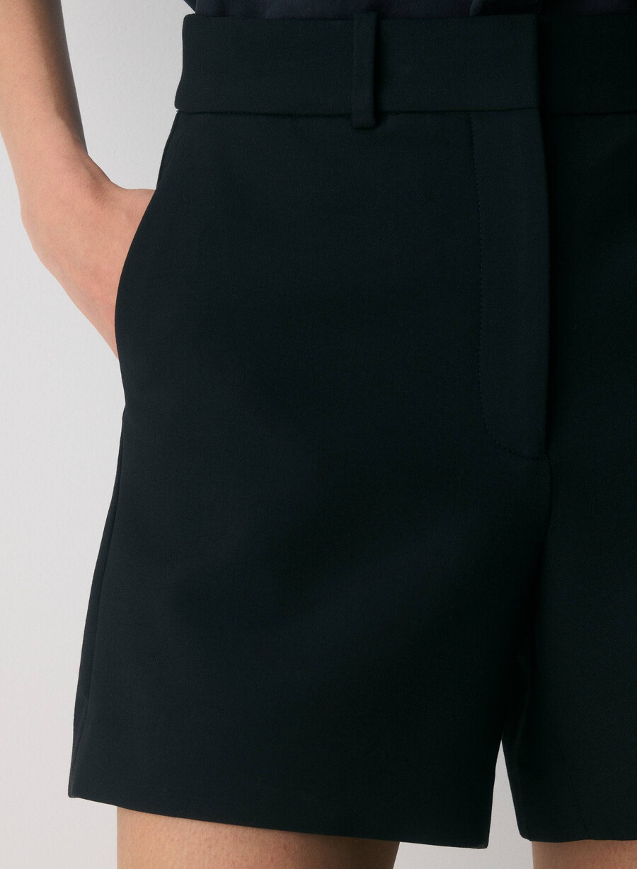 new agency mid-thigh short black