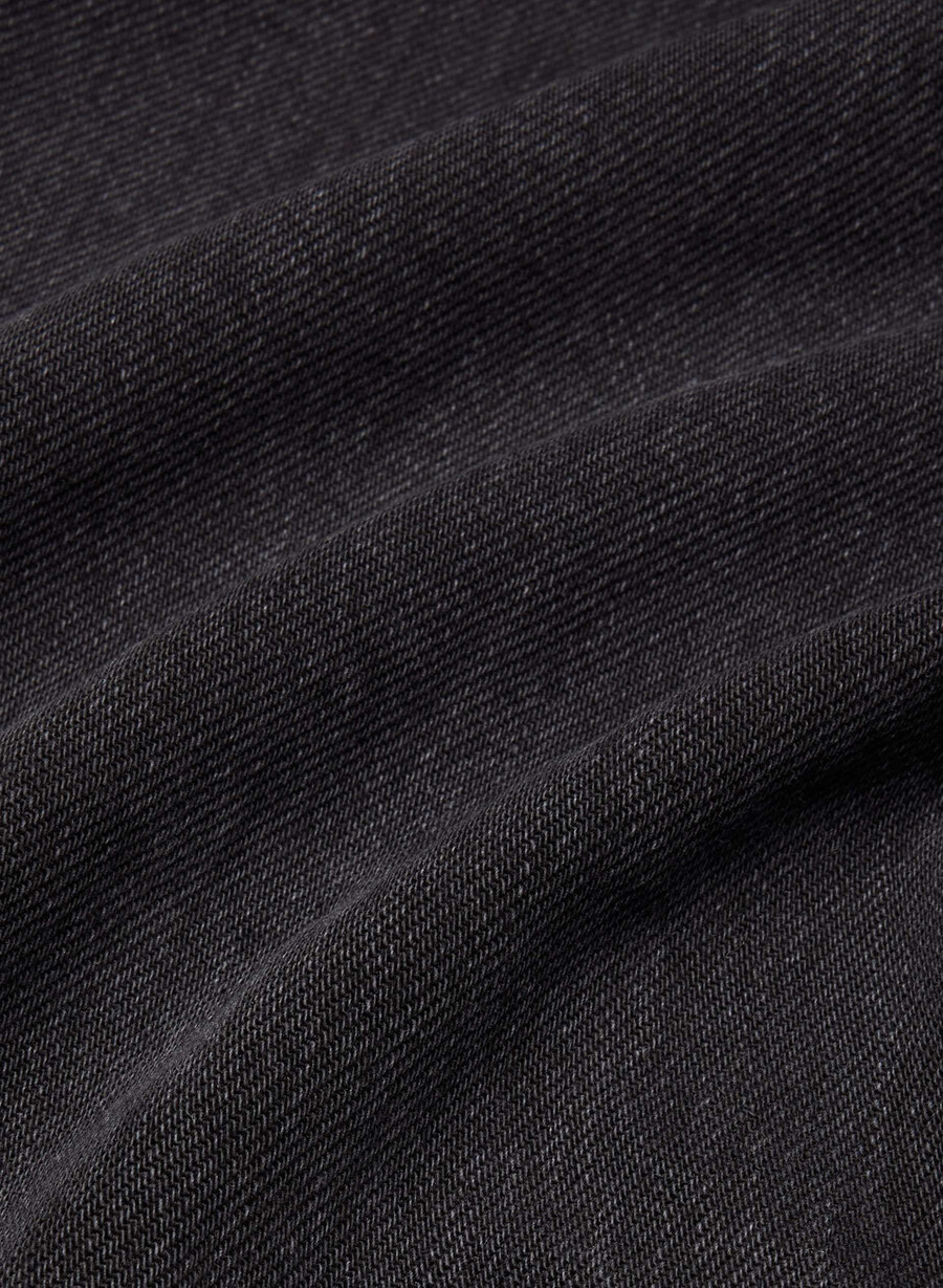 denim forum the 90s vintage lo-rise cuffed jean black eyeliner