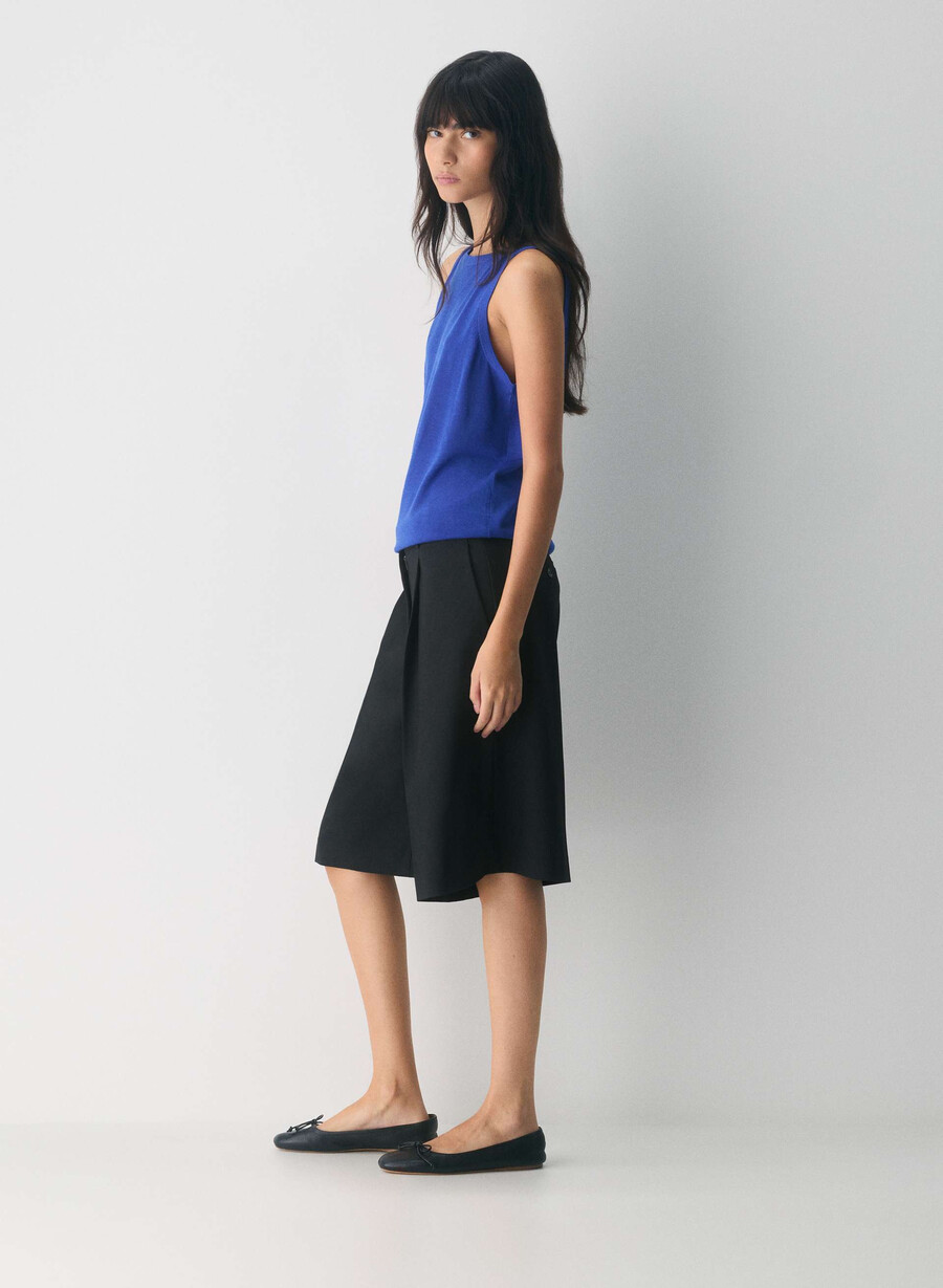 fine merino wool pasture sweater vest ablaze blue