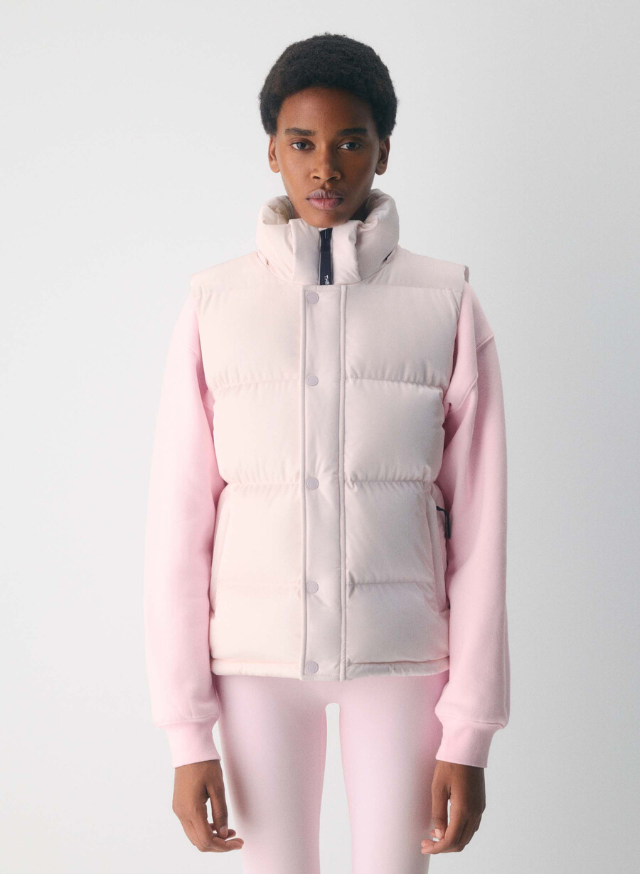 the super puff vest - liquid shine mochi pink