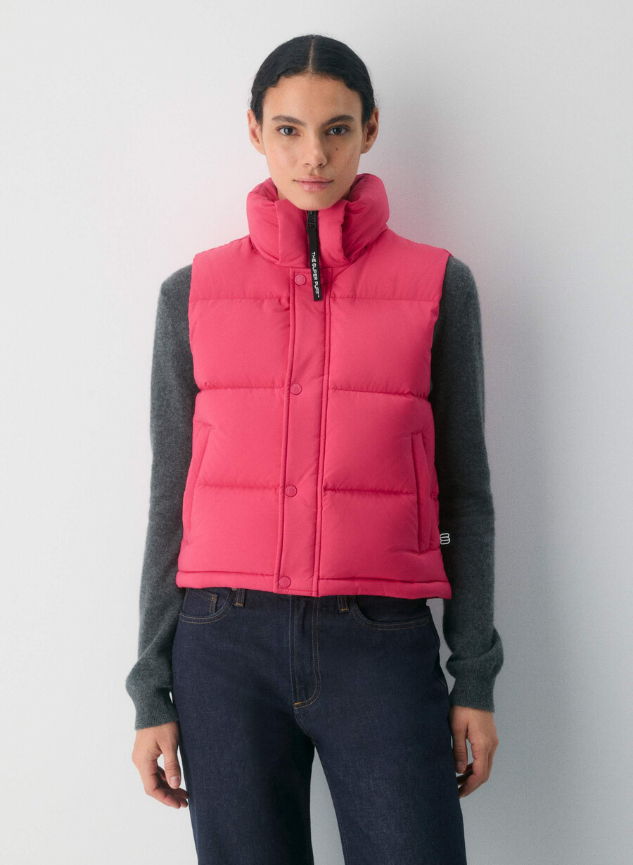 the super puff shorty vest - climatte wink pink