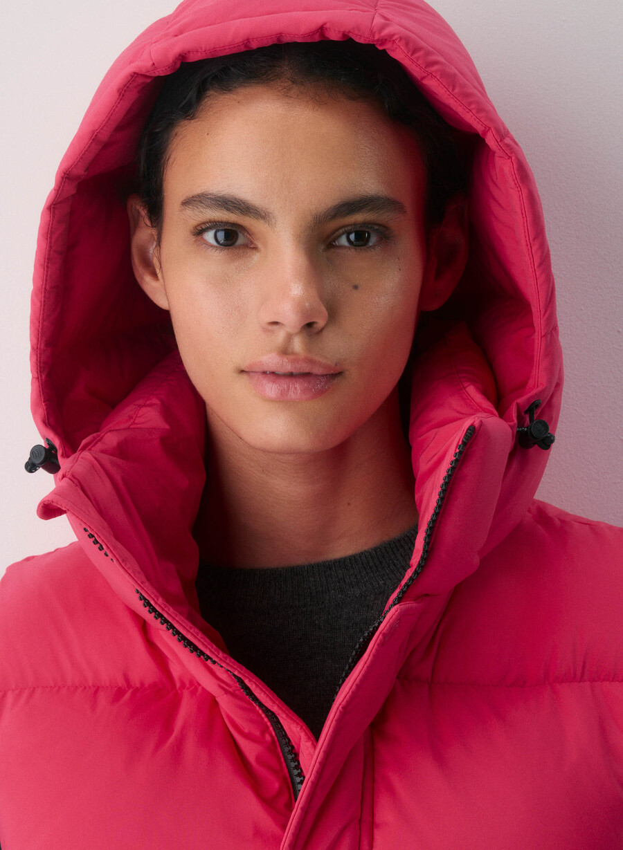 the super puff shorty vest - climatte wink pink